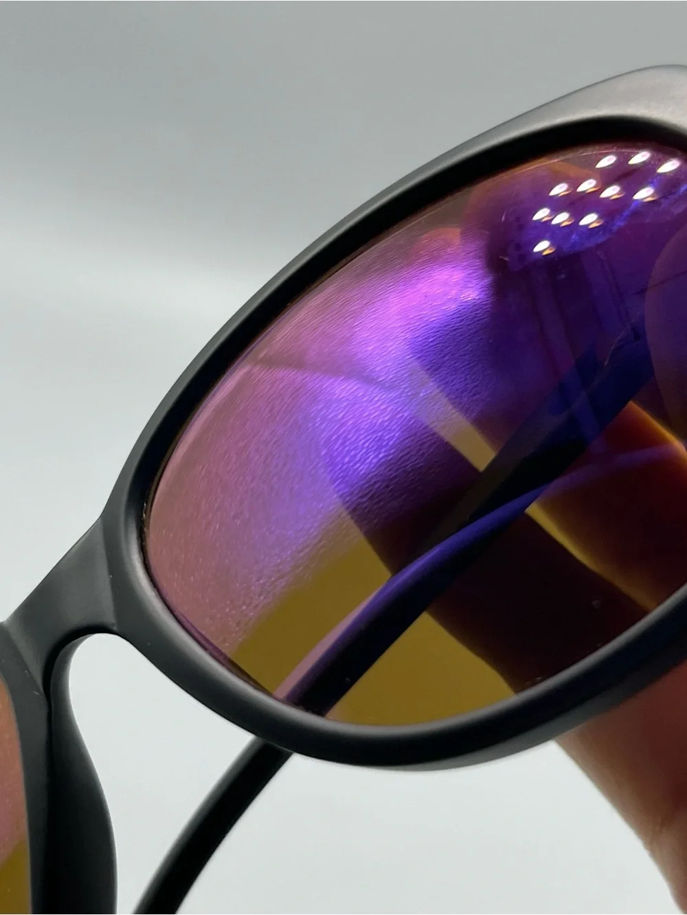 Revo Matte Black Sunglasses with Purple Mirrored Lenses